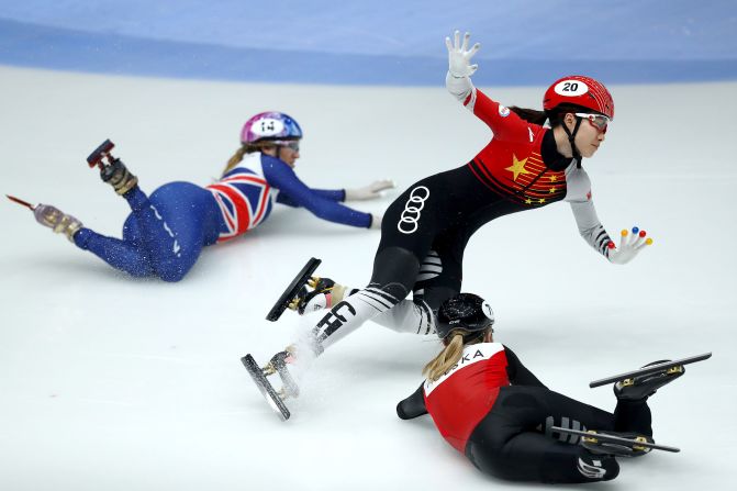 From left, Elise Christie, Chunyu Qu and Kamila Stormowska crash in the Women's 500m final during the ISU World Cup Short Track in Dordrecht, Netherlands, on February 16.