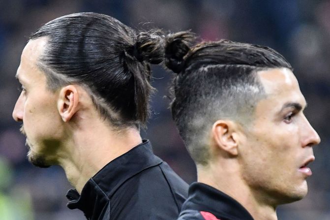 From left, Zlatan Ibrahimovic of AC Milan and Cristiano Ronaldo of Juventus cross paths prior to their Coppa Italia soccer match in Milan, Italy, on February 13.
