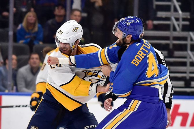 St. Louis Blues defenseman Robert Bortuzzo lands a punch as he fights Nashville Predators defenseman Jarred Tinordi during the first period at Enterprise Center in St. Louis on February 15.