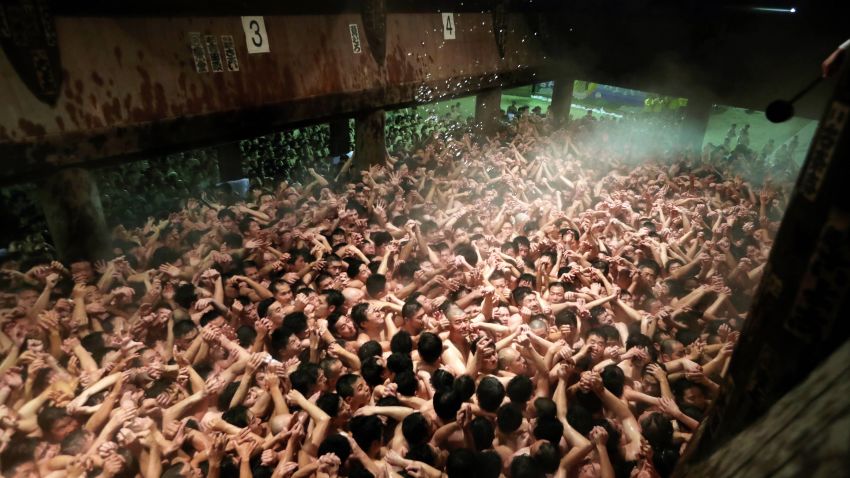 OKAYAMA, JAPAN - FEBRUARY 15: Approximately 10,000 men in loincloths try to snatch a lucky wooden stick during the 'Eyo' naked festival at Saidaiji Temple on February 15, 2020 in Okayama, Japan. After all the lights were turned off, the chief priest tossed a pair of 20-centimetre-long "shingi" sacred sticks from a window 4 meters above ground into the massive throng. Those who left the temple grounds holding the shingi are considered "lucky men" of this year. The Saidaiji-eyo festival, said to date to the Muromachi Period (1338-1573). (Photo by The Asahi Shimbun via Getty Images )