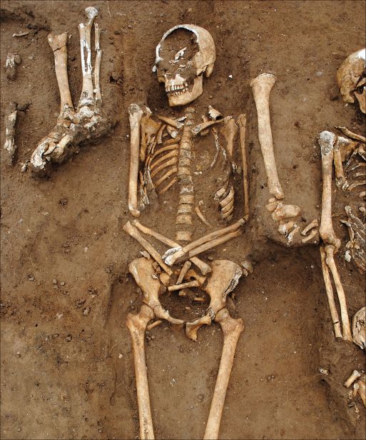 The remains of 48 people who were buried in a 14th century Black Death mass grave were found in England's Lincolnshire countryside.