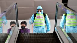 TAIYUAN, Feb. 14, 2020 -- A staff member disinfects an escalator at Wusu International Airport in Taiyuan, capital of north China's Shanxi Province, Feb. 14, 2020. To ensure the safety of passengers, Wusu International Airport has stepped up the disinfection of public facilities and the temperature measuring of passengers to curb the spread of the novel coronavirus. (Photo by Cao Yang/Xinhua via Getty) (Xinhua/Cao Yang via Getty Images)