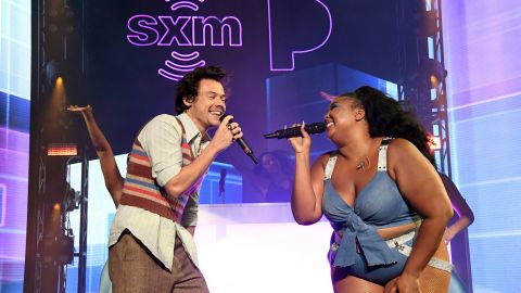 Harry Styles and Lizzo perform an performing in Miami. (Kevin Mazur/Getty Images)