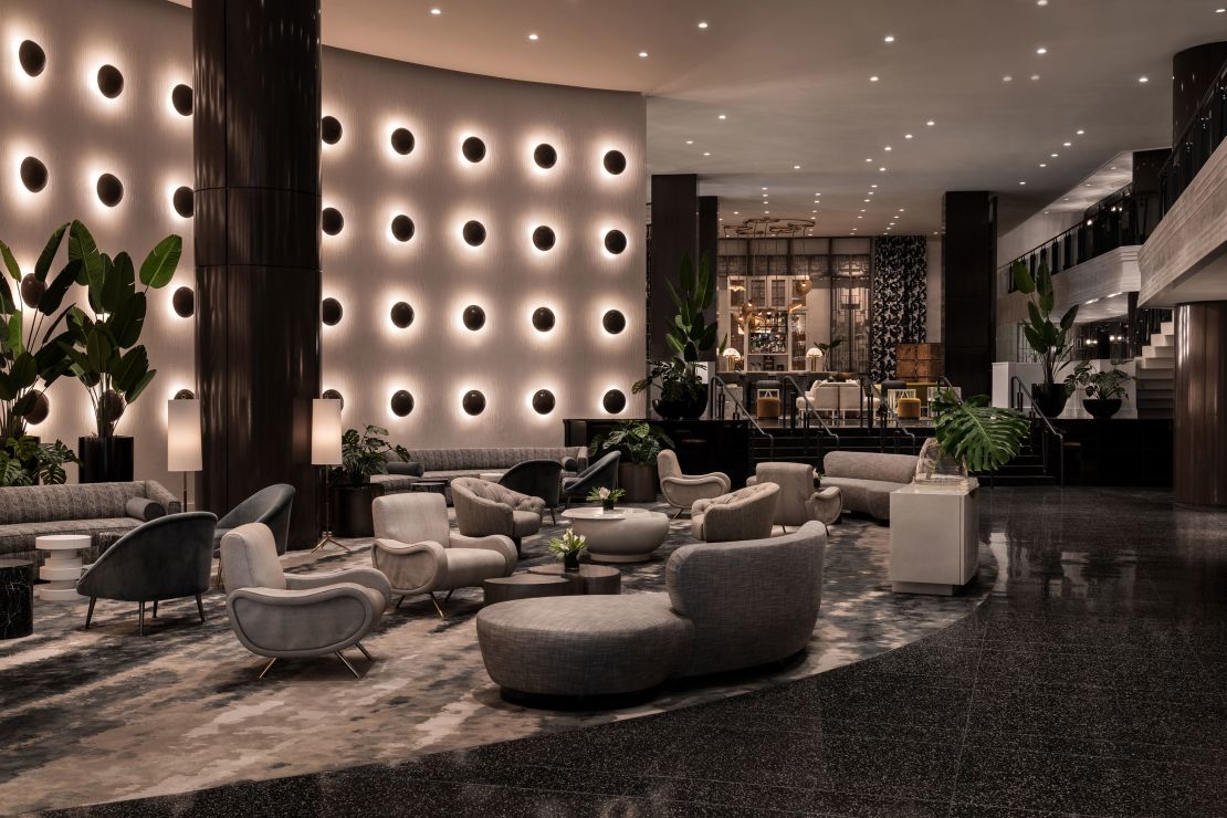 The landmark Ritz Carlton building, from famed Art Deco architect Morris Lapidus, includes many original interior details -- most strikingly, the chrome sphere light wall in the lobby.