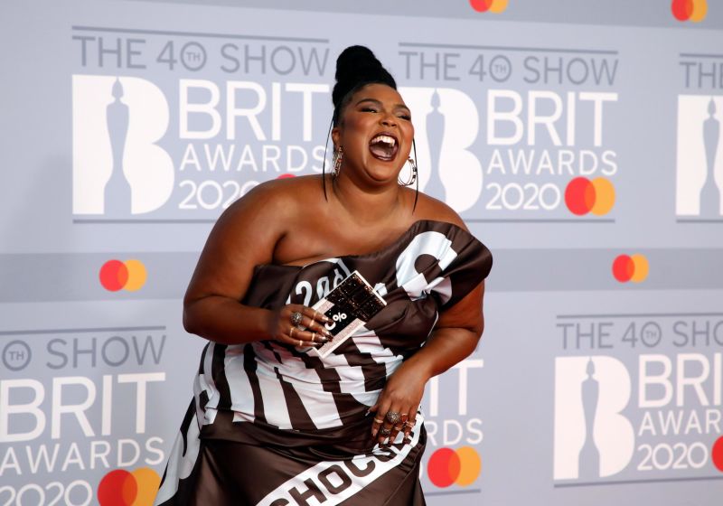 From Lizzo s Hershey dress to Harry Styles s bright yellow suit Brit Awards stars had a night of playful fashion CNN