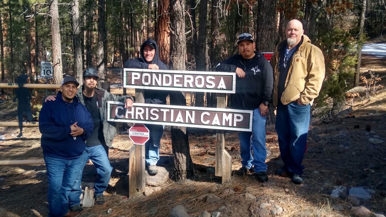 Joshua Melendrez, far left, stands next to his business partner, Lawrence Jaramillo, and other members of the team.