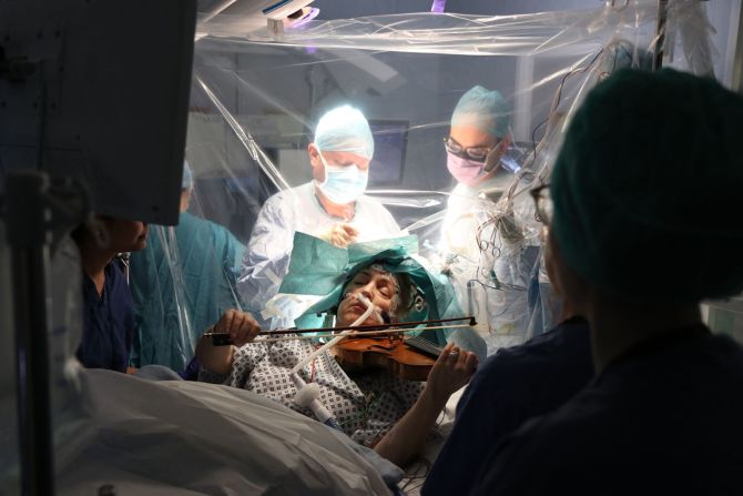 Professional violinist Dagmar Turner plays her instrument as surgeons in London remove a tumor from her brain on Tuesday, February 18. <a href="https://www.cnn.com/2020/02/19/world/violin-brain-surgery-trnd/index.html" target="_blank">Surgeons asked Turner to play the violin</a> to ensure that her musical abilities were not damaged during the procedure.