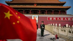 A Chinese soldier stands guard in front of Tiananmen Gate outside the Forbidden City on October 27, 2014 in Beijing, China.
