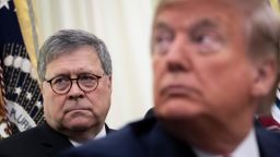 U.S. Attorney General William Barr and U.S. President Donald Trump are seen in the Oval Office of the White House on November 26, 2019 in Washington.