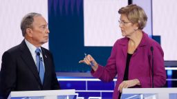 Democratic presidential candidates, former New York City Mayor Mike Bloomberg, left, and Sen. Elizabeth Warren, D-Mass., talk before a Democratic presidential primary debate Wednesday, Feb. 19, 2020, in Las Vegas, hosted by NBC News and MSNBC. (AP Photo/John Locher)