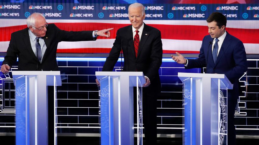 Democratic presidential candidate Sen. Bernie Sanders, I-Vt., points at former Vice President Joe Biden, and former South Bend Mayor Pete Buttigieg, right, during a Democratic presidential primary debate Wednesday, Feb. 19, 2020, in Las Vegas, hosted by NBC News and MSNBC. (AP Photo/John Locher)