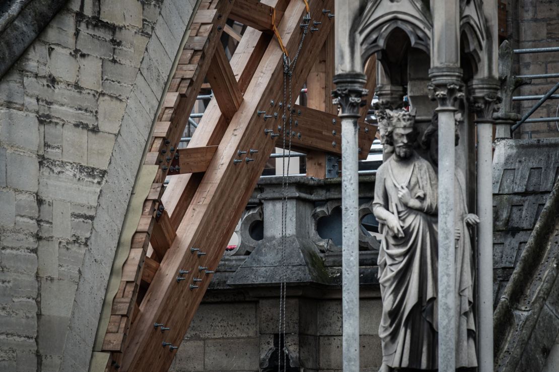 Wood structures support a buttress at the Notre-Dame Cathedral in Paris, 2019