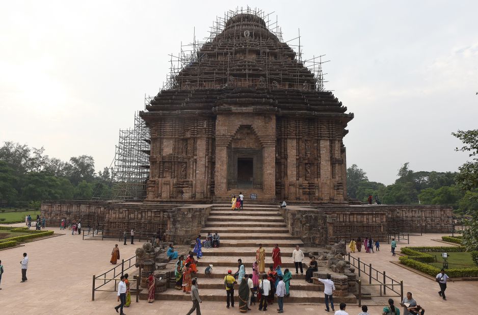 Tourists pictured at the Konark Sun Temple, built by King Narasimhadeva I of the Eastern Ganga Dynasty in around 1250. The temple is now a UNESCO World Heritage Site.