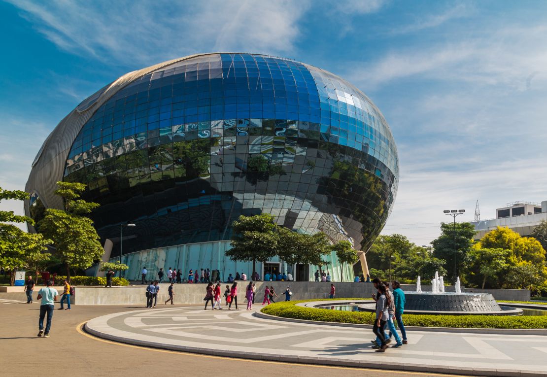 No, that's not a UFO! It's one of the two "spaceship" buildings on the Infosys Pune campus.