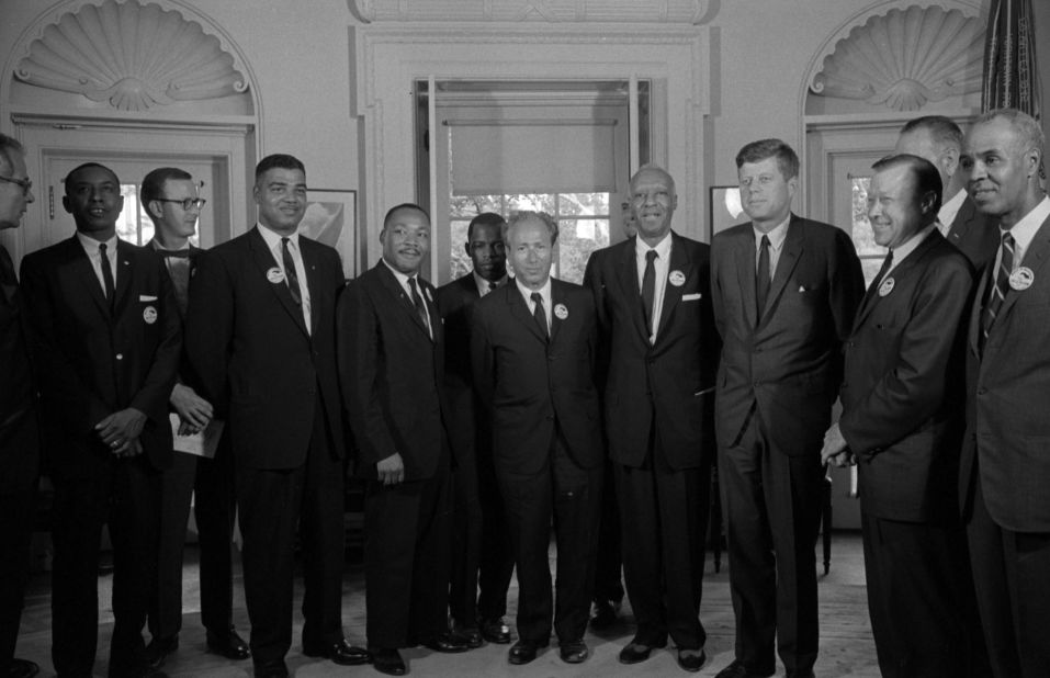US President John F. Kennedy, fourth from right, meets with Lewis and other civil rights leaders after the 1963 March on Washington. Lewis is in the center, next to Martin Luther King Jr. 