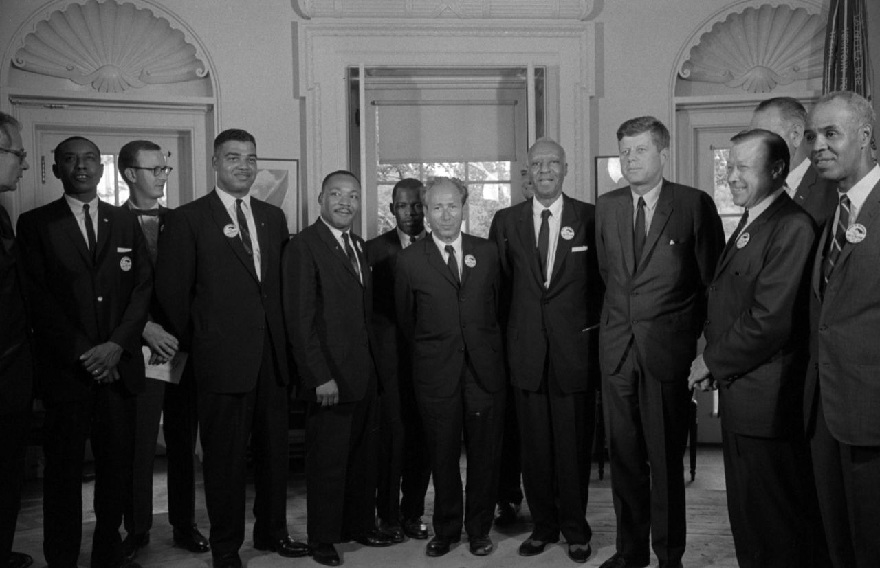 US President John F. Kennedy, fourth from right, meets with Lewis and other civil rights leaders after the 1963 March on Washington. Lewis is in the center, next to Martin Luther King Jr. 