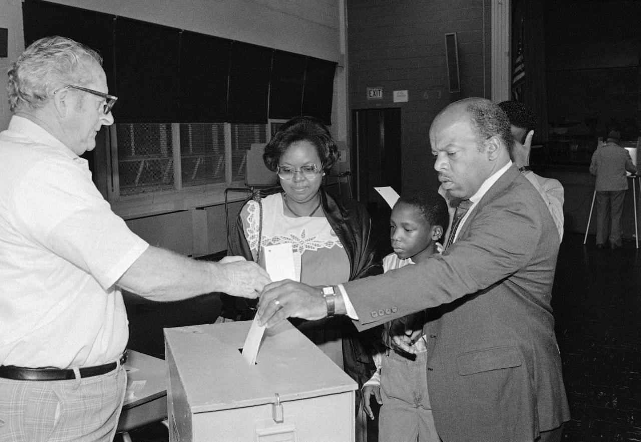 Lewis, running for Congress again, casts his ballot in Atlanta in September 1986. He won a runoff election in the Democratic primary, defeating Julian Bond. He easily won the general election in November.