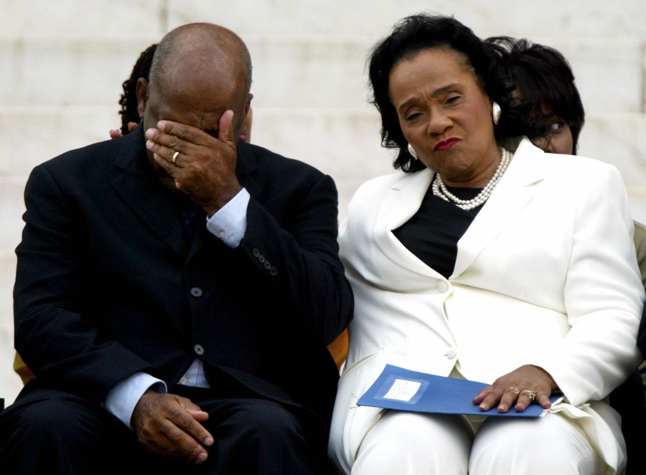 Lewis is comforted by Coretta Scott King during a ceremony at the Lincoln Memorial in August 2003. A plaque was unveiled there honoring Martin Luther King Jr.