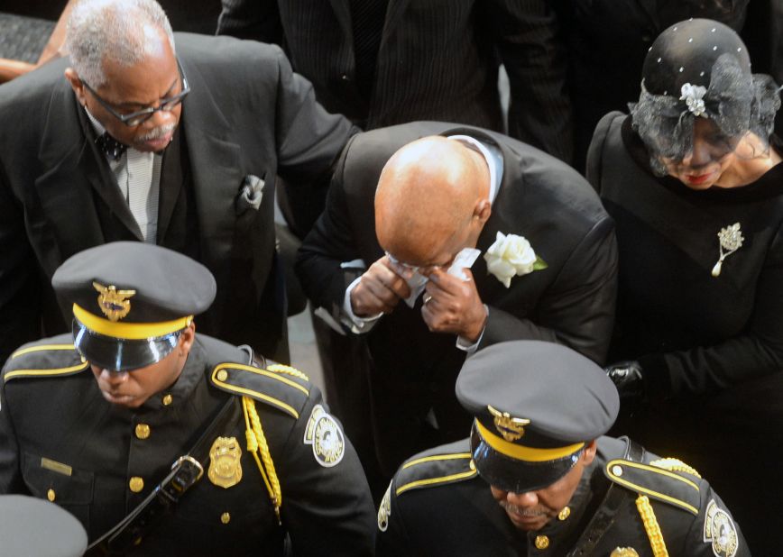 Lewis becomes emotional at the funeral services for his wife, Lillian, in January 2013. They were married for 44 years.