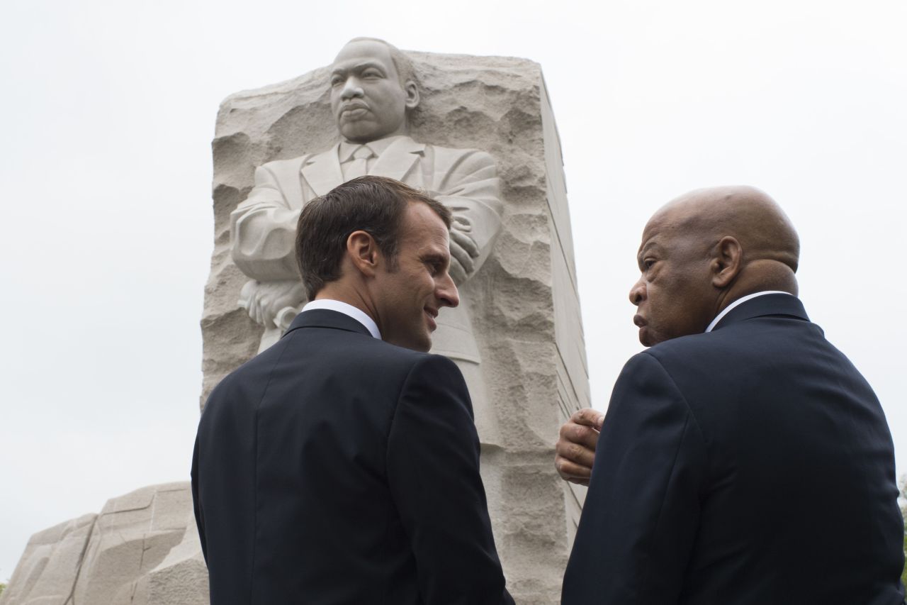 Lewis stands with French President Emmanuel Macron at the Martin Luther King Jr. Memorial in Washington, DC, in April 2018.