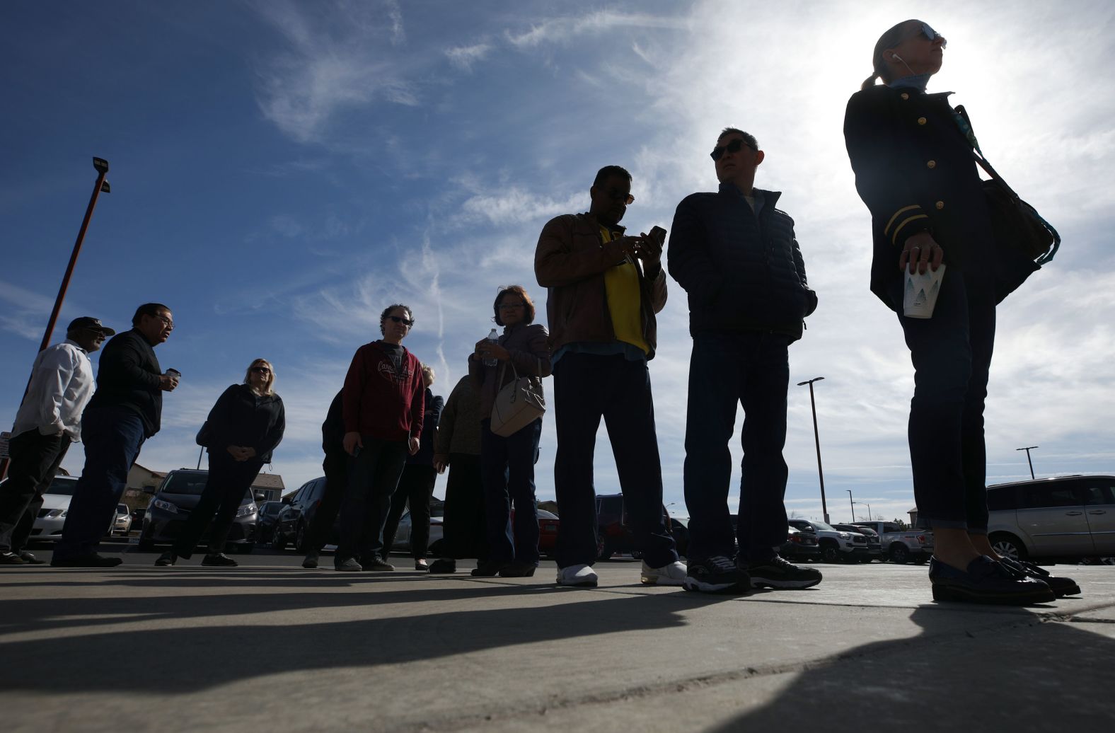 People in Henderson wait in line for early voting on Tuesday. It was the last day for early voting.