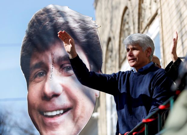 Rod Blagojevich, the former Illinois governor who was convicted in 2010 for a host of public corruption charges, waves after speaking to reporters outside his Chicago home on Wednesday, February 19. He had just had his prison sentence <a href="https://www.cnn.com/2020/02/18/politics/donald-trump-rod-blagojevich-commutation-sentence/index.html" target="_blank">commuted by President Donald Trump.</a> He served eight years of a 14-year sentence.