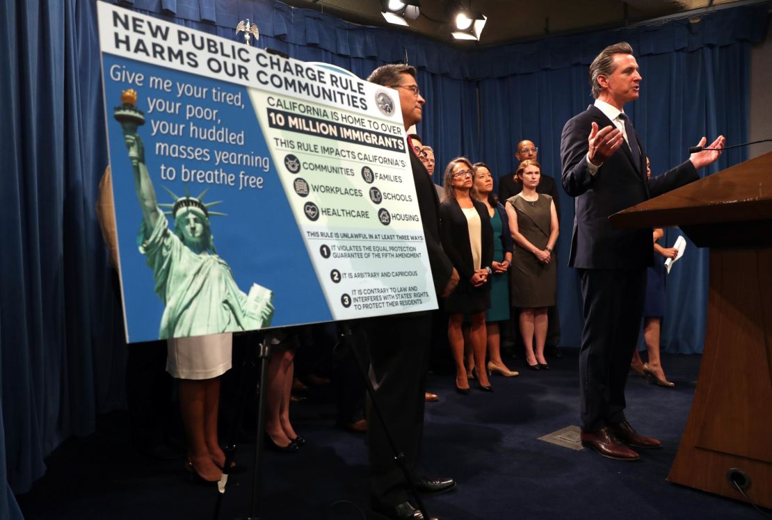 California Gov. Gavin Newsom speaks at an August news conference announcing his state's lawsuit against the Trump administration over the public charge rule. 