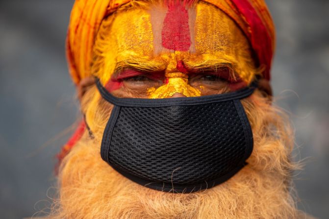 A man in Kathmandu, Nepal, wears a face mask as he takes part in a religious rally to mark the annual Hindu festival of Maha Shivaratri on Wednesday, February 19. <a href="http://www.cnn.com/2020/02/13/world/gallery/week-in-photos-0214/index.html" target="_blank">See last week in 28 photos</a>