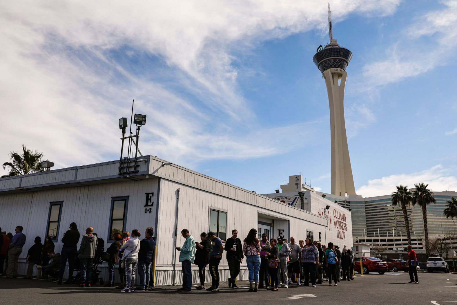 People wait to cast their ballots during the second day of early voting.