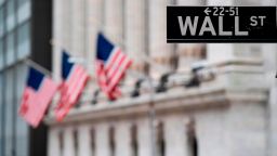 A sign reading "Wall Street" is pictured in front of New York Stock Exchange (NYSE) on January 13, 2020 in New York City. (Photo by Johannes EISELE / AFP) (Photo by JOHANNES EISELE/AFP via Getty Images)