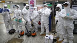 Disinfection workers wear protective gears and get ready to disinfect against the coronavirus (COVID-19) at the subway station on February 21, 2020 in Seoul, South Korea. South Korea reported 52 new cases of the coronavirus (COVID-19) bringing the total number of infections in the nation to 156, with the potentially fatal illness spreading fast across the country.
