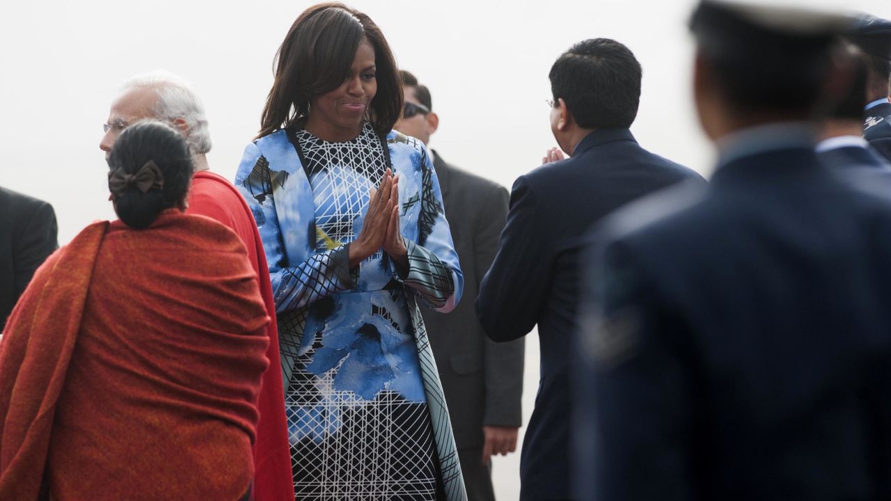 Michelle Obama greets Indian officials upon arrival in New Delhi.