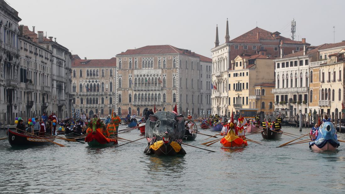 <strong>Venice, Italy:</strong> Boats sail during the water parade, part of the Venice Carnival, on Sunday, February 9. The festivities in the lagoon city attract people from around the world, but this year celebrations were cut short due to Italy's coronavirus outbreak. 