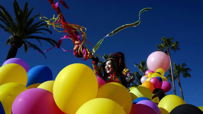 <strong>Nice, France:</strong> A participant in fancy dress takes part in the 136th Nice Carnival parade on Saturday, February 15.