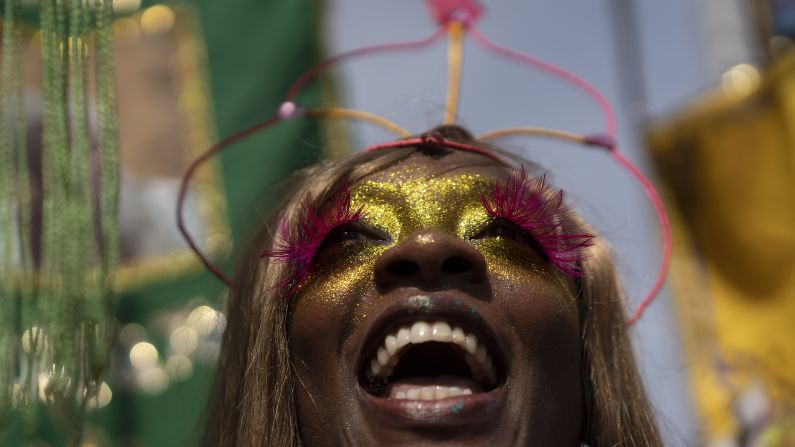 <strong>Rio de Janeiro, Brazil: </strong>A reveler in a costume enjoys the "Cordao do Boitata" street party on Sunday, February 16.