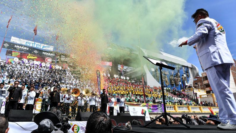 <strong>Oruro, Bolivia:</strong> An orchestra conductor leads his musicians during the Oruro Carnival Band Festival, on Saturday, February 15.
