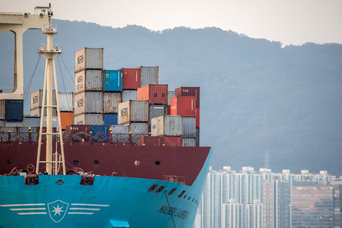 Shipping containers sit aboard a Maersk cargo ship in Hong Kong.