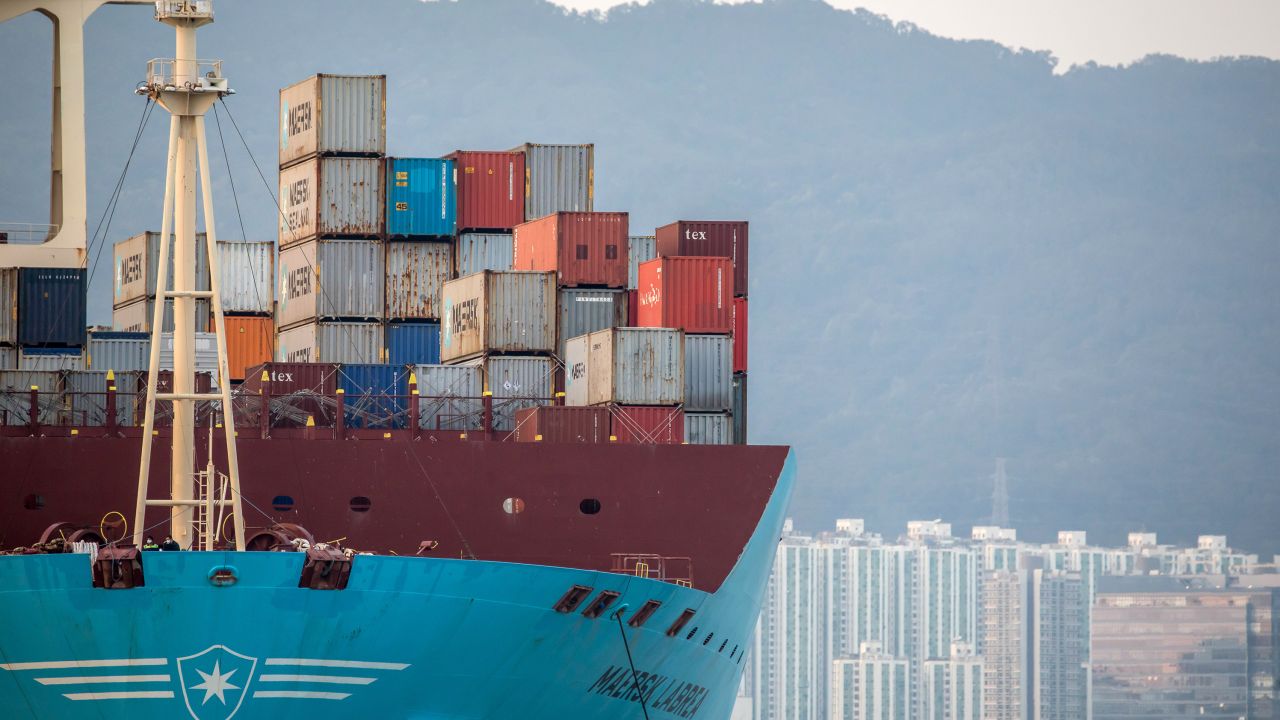 Shipping containers sit aboard a Maersk cargo ship in Hong Kong.