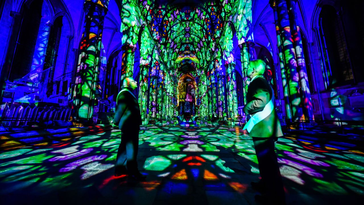 <strong>Salisbury, UK:</strong> England's Salisbury Cathedral dazzles during a light and sound art installation, titled "Sarum Lights," to mark the cathedral's 800th anniversary in 2020. 