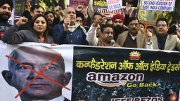 Traders hold placards during a demonstration demanding the closure of online shopping platforms Amazon and Flipkart, in New Delhi on January 15, 2020. Bezos, whose worth has been estimated at more than $110 billion, is officially in India for a meeting of business leaders in New Delhi. (Photo by Sajjad Hussain/AFP/Getty Images)