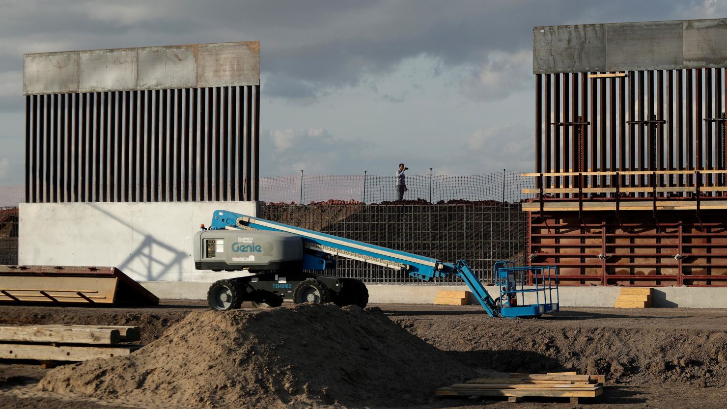 In this November 2019 file photo, the first panels of levee border wall are seen at a construction site along the US-Mexico border in Donna, Texas. 