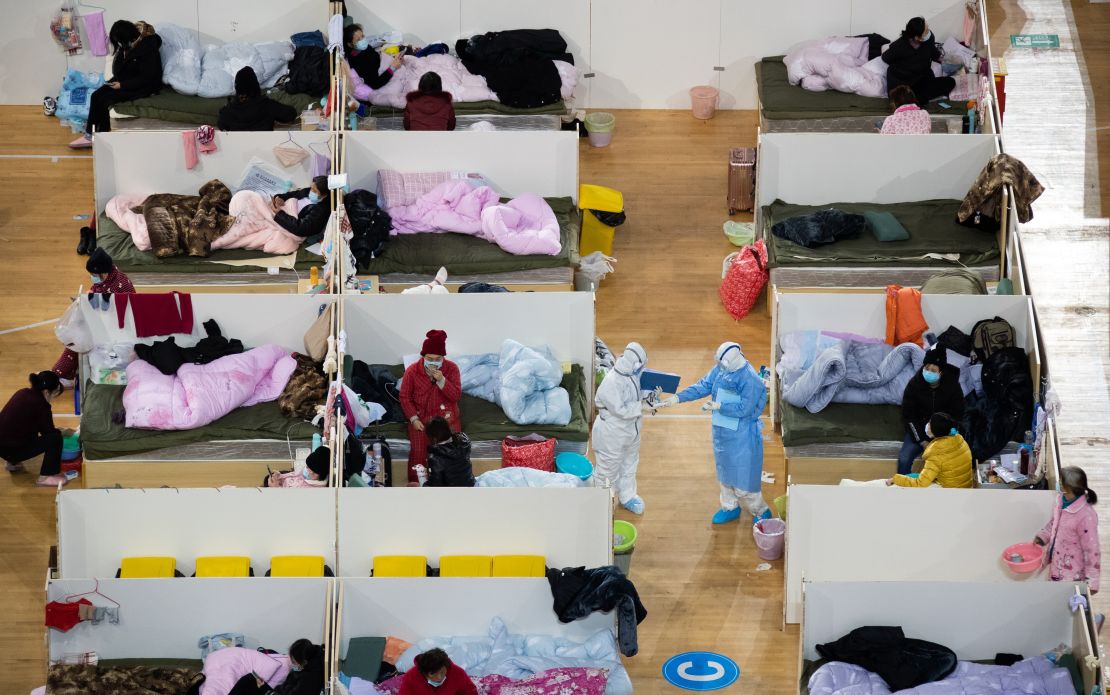 Patients at night in a "Fangcang hospital" -- a makeshift quarantine shelter converted from the Hongshan Gymnasium in Wuhan.