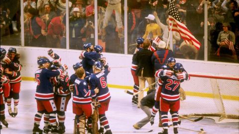 The team celebrates winning the gold medal after defeating Finland 4-2 during the 1980 Winter Olympic Games on February 24, 1980 in Lake Placid, New York.