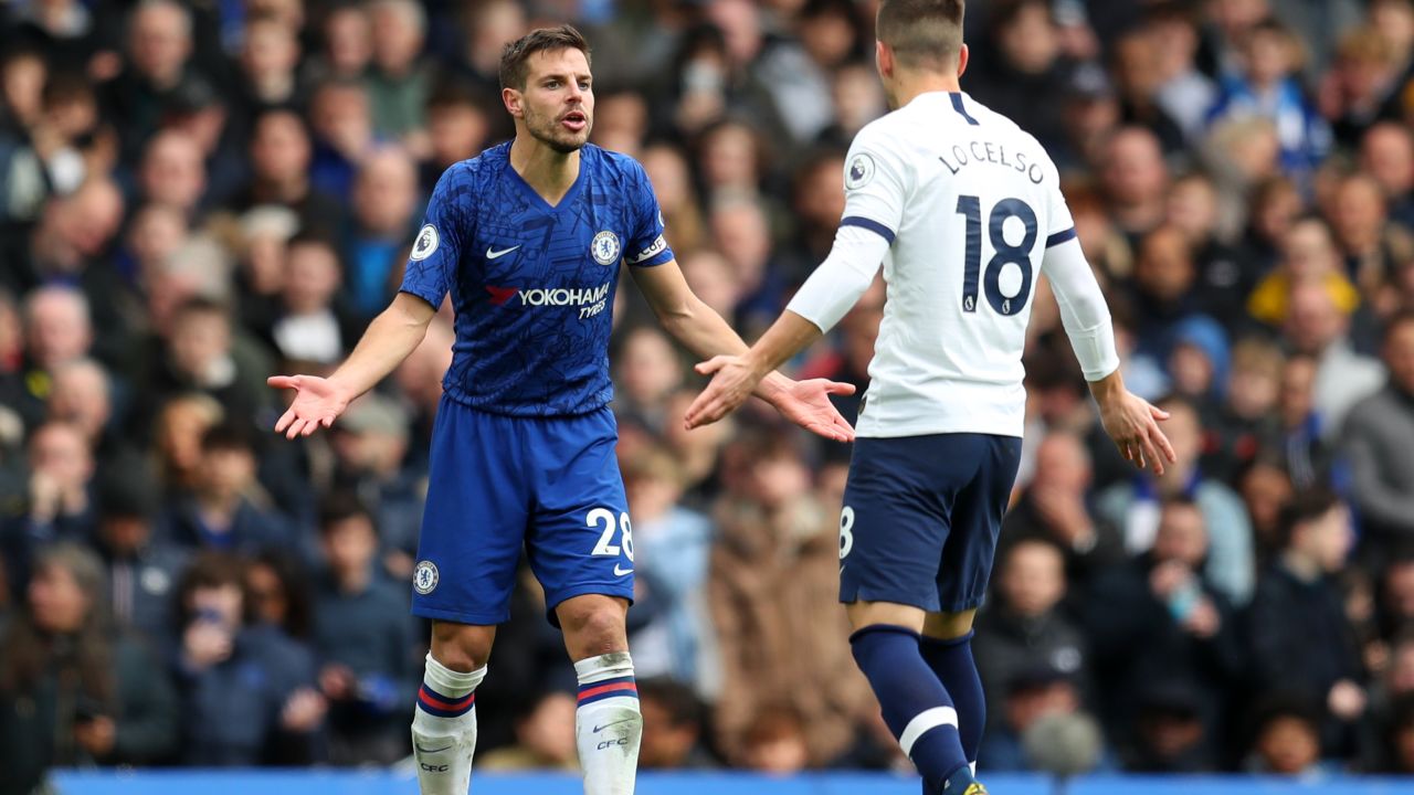 Chelsea's Cesar Azpilicueta and Giovani Lo Celso of Tottenham Hotspur are engaged in a heated discussion during their side's English Premier League match at Stamford Bridge.