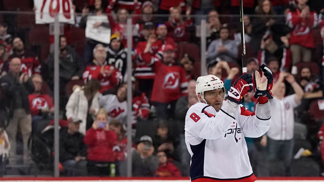 Alex Ovechkin of the Washington Capitals celebrates after scoring his 700th career NHL goal in the third period against the New Jersey Devils at Prudential Center on February 22.