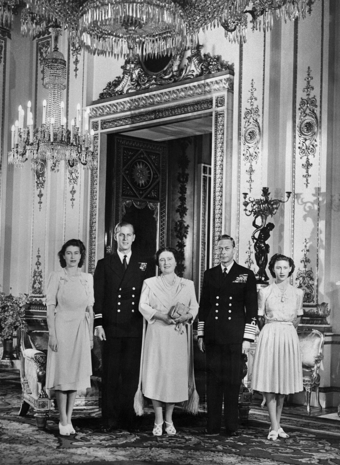 Princess Elizabeth (future Queen Elizabeth II); Philip Mountbatten (also the Duke of Edinburgh); Queen Elizabeth (future Queen Mother), King George VI and Princess Margaret pose in 1947.