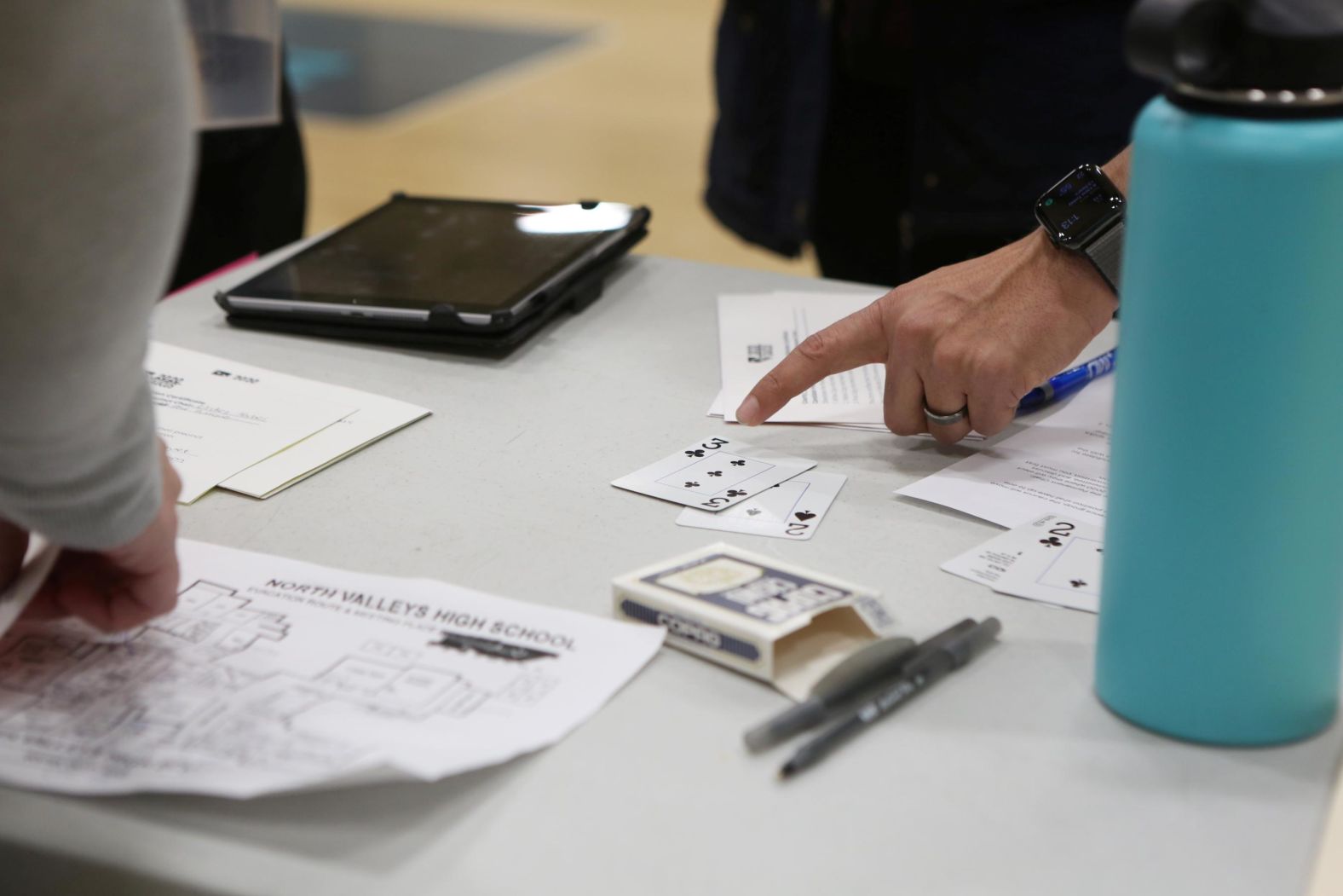 A precinct chair shows two cards <a href="index.php?page=&url=https%3A%2F%2Fwww.cnn.com%2Fpolitics%2Flive-news%2Fnevada-caucuses-live-results-updates-2020%2Fh_4548447f4571255b72d6953b654c6e2d" target="_blank">that were used to break a tie</a> at a caucus site in Reno, Nevada.