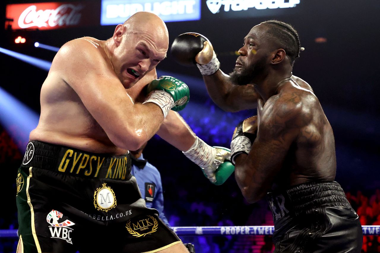 Wilder throws a punch at Fury.