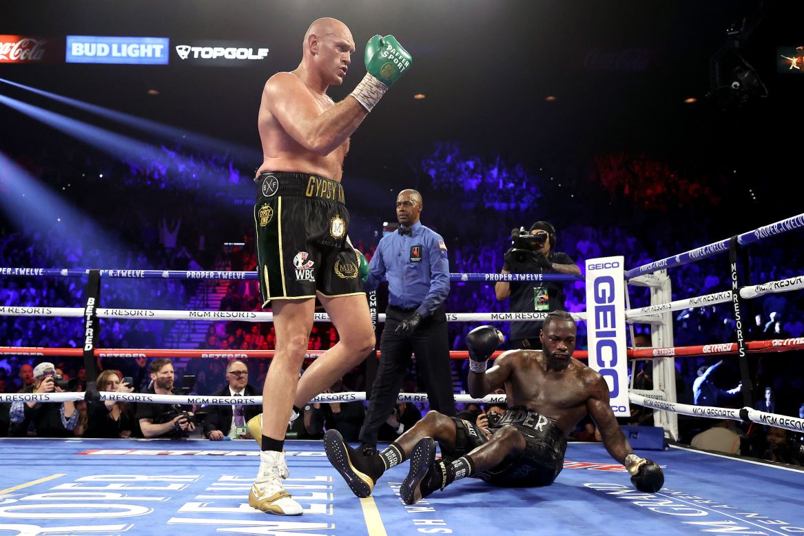 Fury knocks down Wilder during the fifth round.
