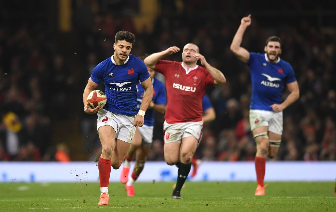 France's Romain Ntamack races away to score his side's crucial third try in the 27-23 win over Wales at the Principality Stadium in Cardiff.